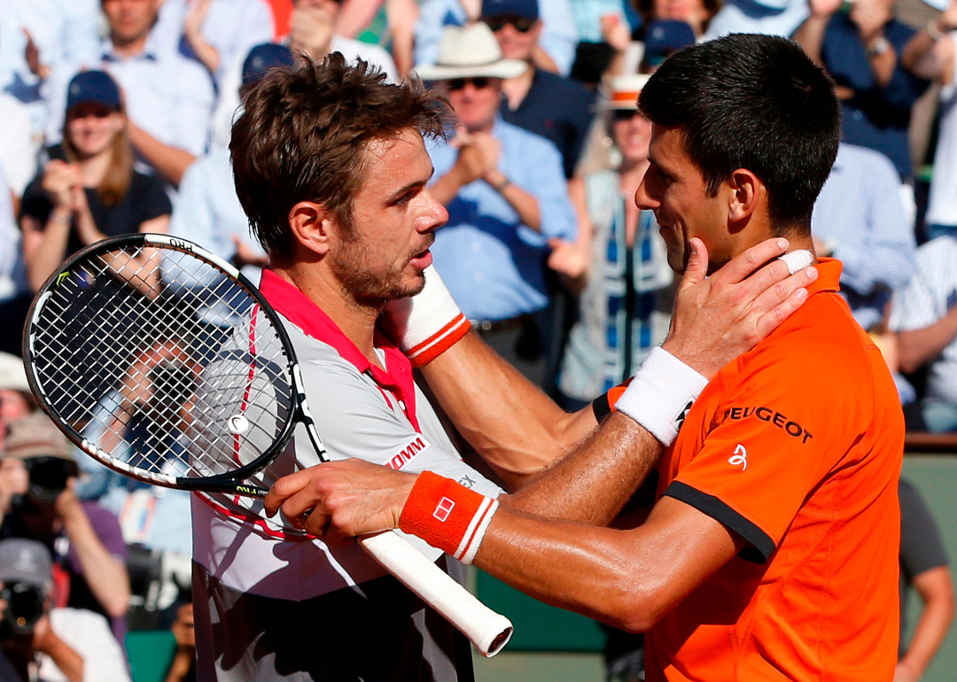 Novak Djokovic congratulates Stanislas Wawrinka on winning the 2015 French Open.