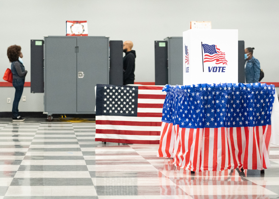 Voters cast ballots at polling place