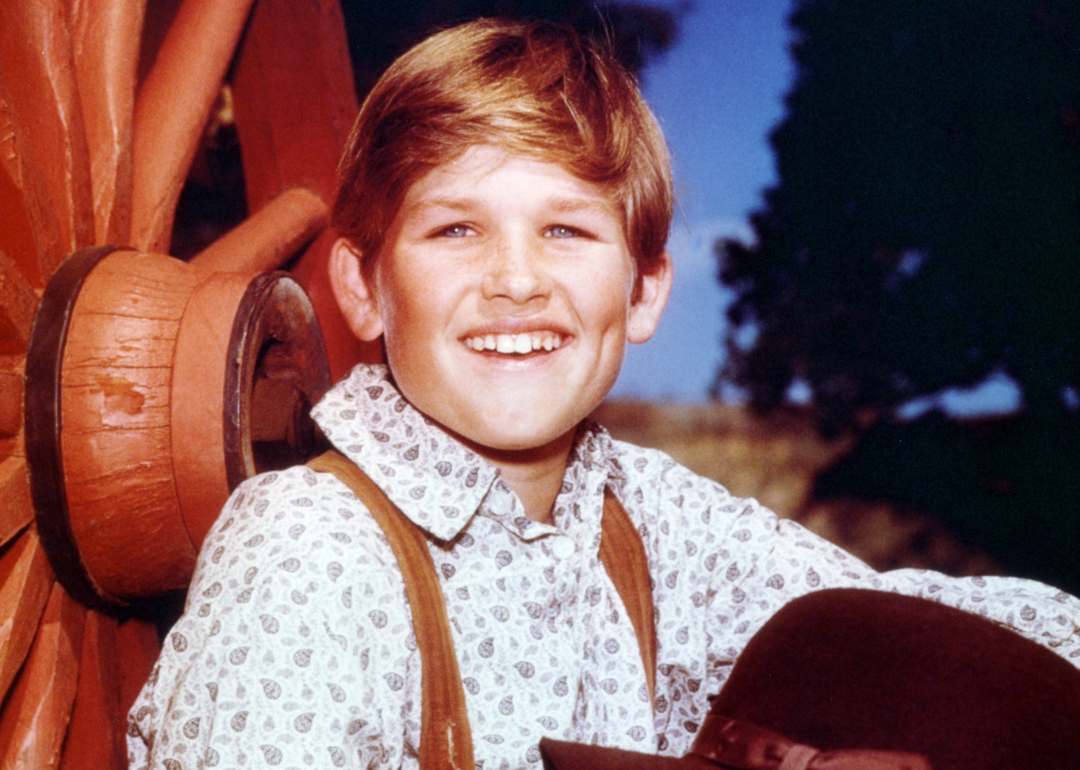 Kurt Russell smiles in a promotional portrait for 'The Travels of Jaimie McPheeters’.