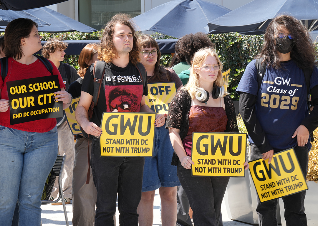University students across Washington protest with signs.