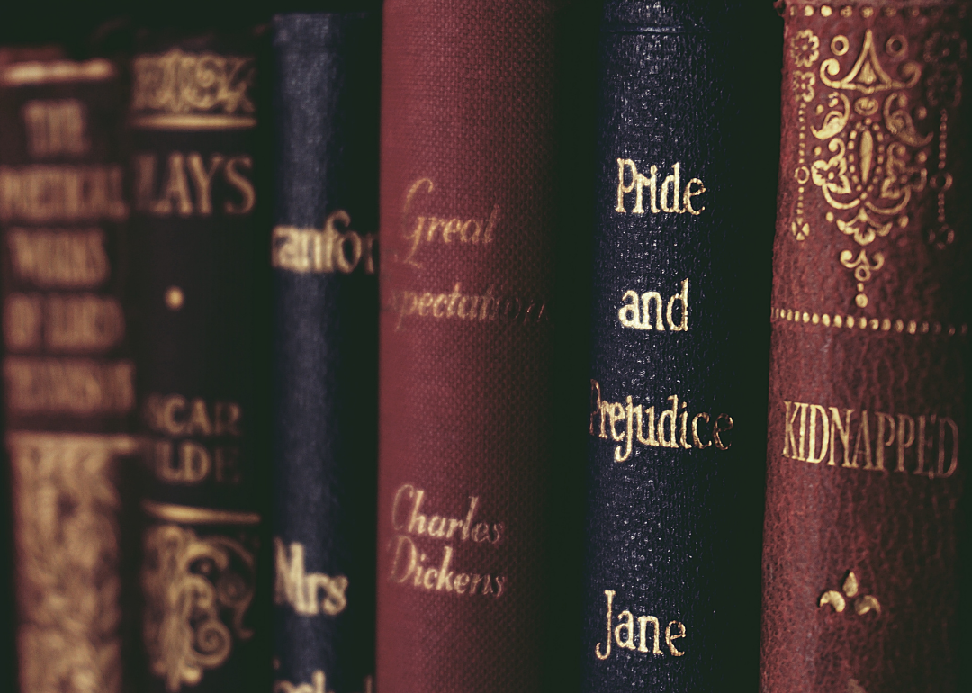 Closeup of classic books, like "Pride and Prejudice," on a shelf.