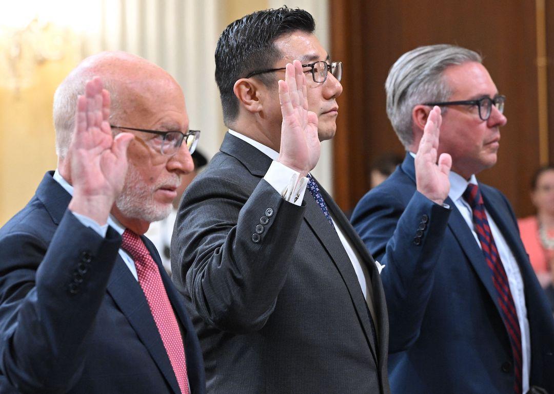 Conservative Republican election attorney Ben Ginsberg, Former Georgia US Attorney B.J. Pak and former Philadelphia city commissioner Al Schmidt, are sworn-in before testifying during a hearing by the Select Committee to Investigate the January 6th Attack on the US Capitol in the Cannon House Office Building on June 13, 2022 in Washington, DC.