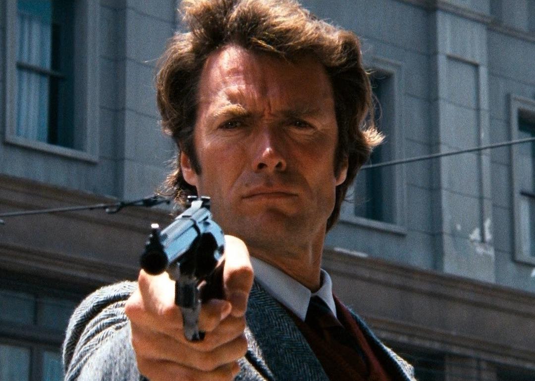 Clint Eastwood holding a gun while uttering the famous quote, "You've got to ask yourself one question: 'Do I feel lucky?' Well, do ya, punk?" in "Dirty Harry."