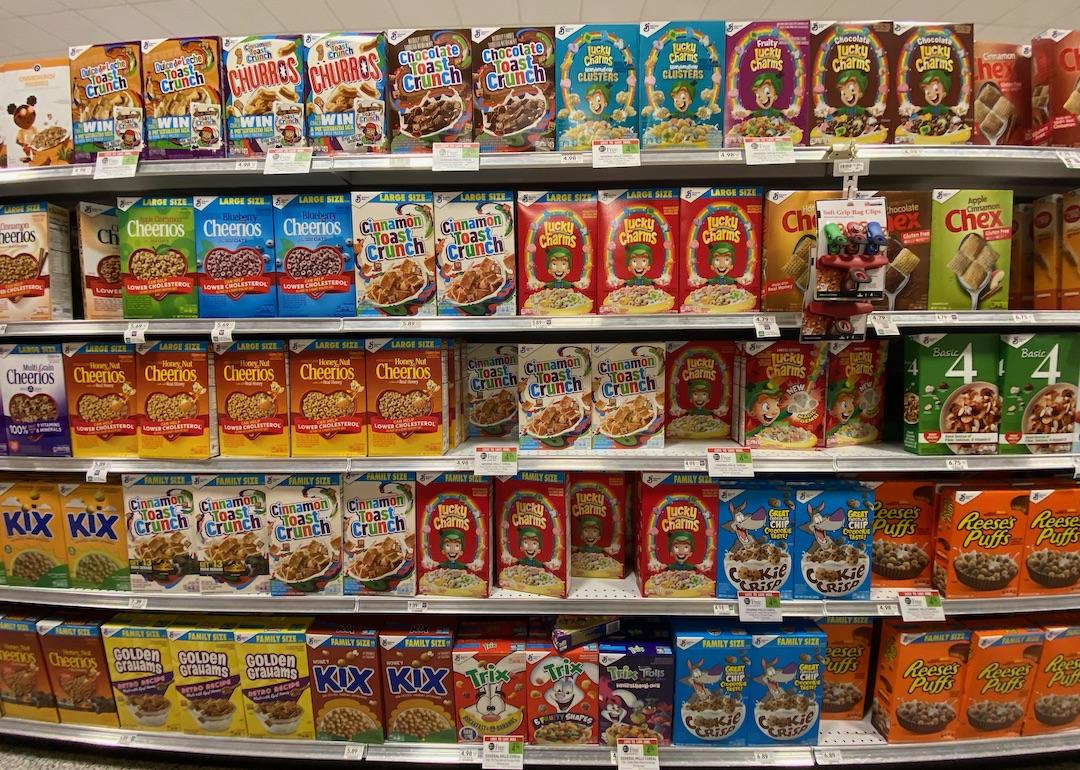 Family-sized cereal boxes in grocery store aisle