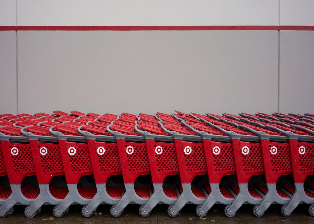 Rows of Target branded shopping carts parked outside a Target Store in Tigard, a southwestern suburb within the Portland, Washington metro area.