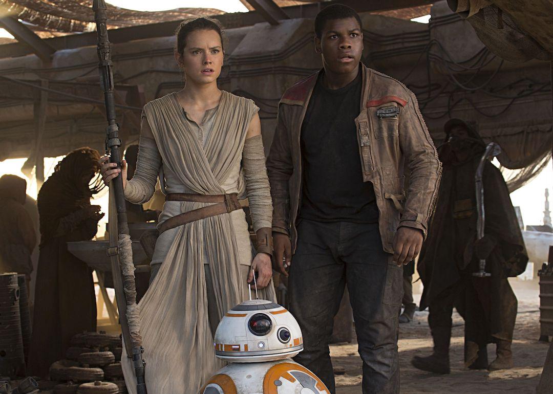Daisy Ridley and John Boyega in a scene from "Star Wars: The Force Awakens"