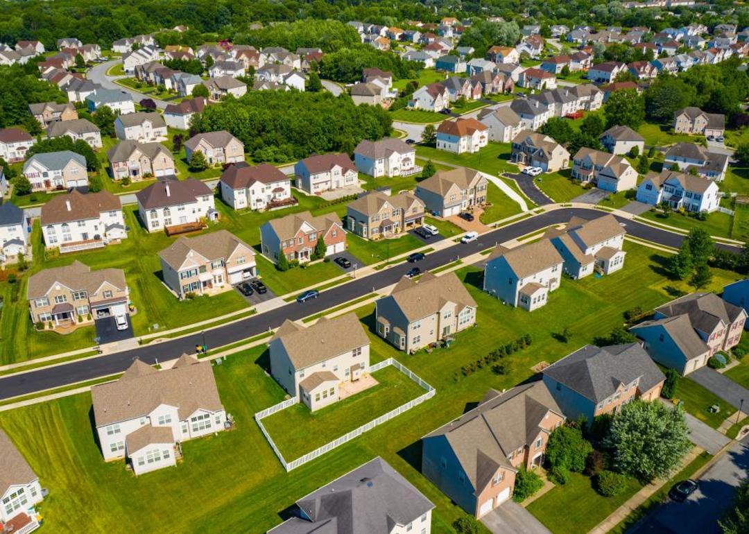 Aerial overhead shot of picturesque homes in a suburban neighborhood