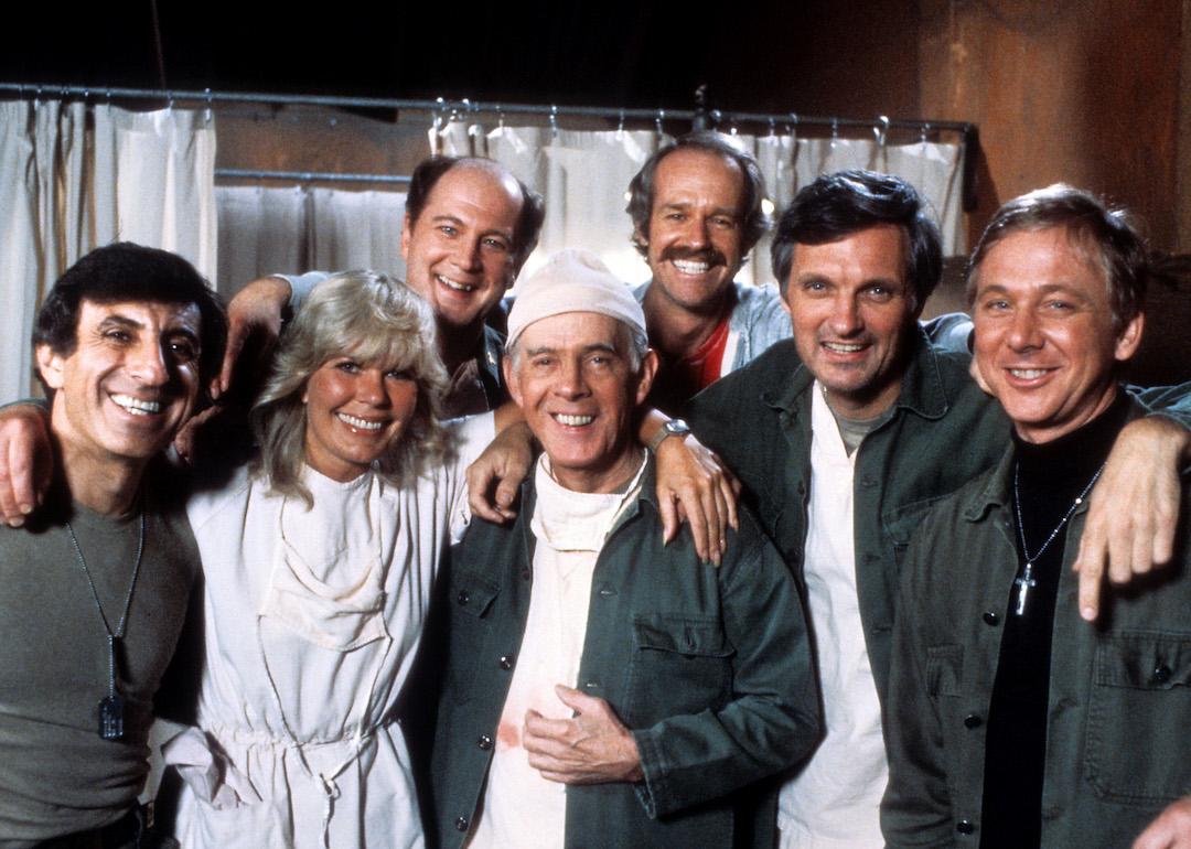 Jamie Farr, Loretta Swit, David Ogden Stiers, Harry Morgan, Mike Farrell, Alan Alda, and William Christopher in publicity portrait for for "M*A*S*H"