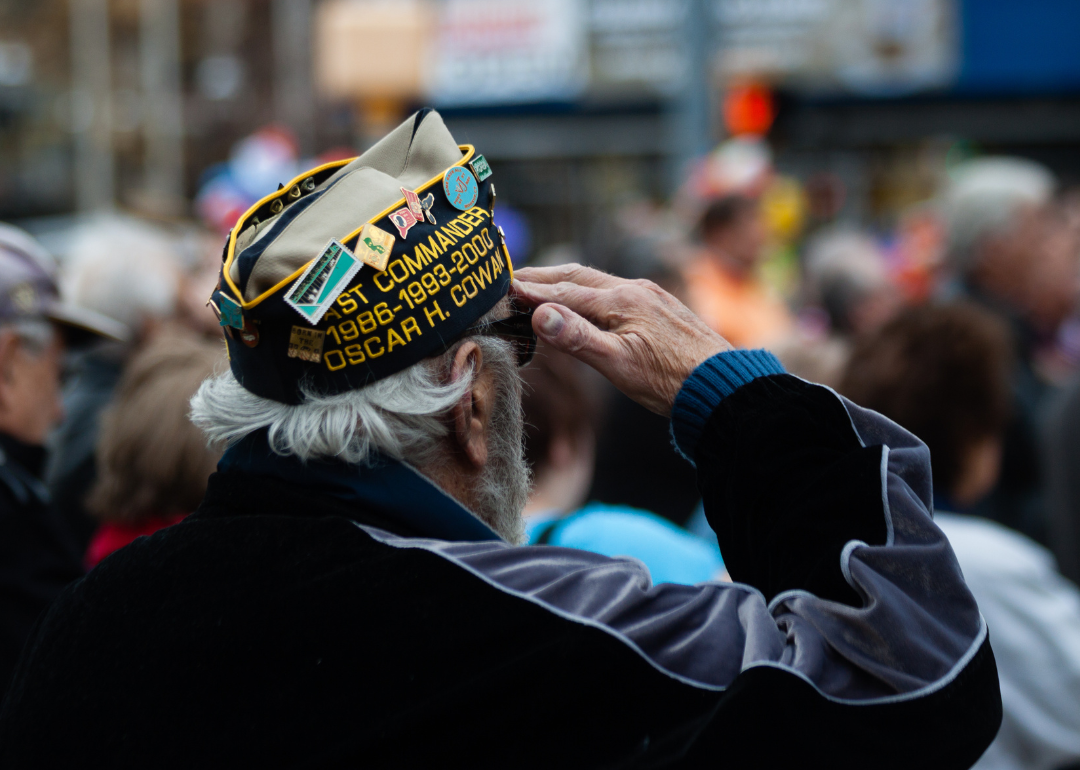 Senior veteran saluting