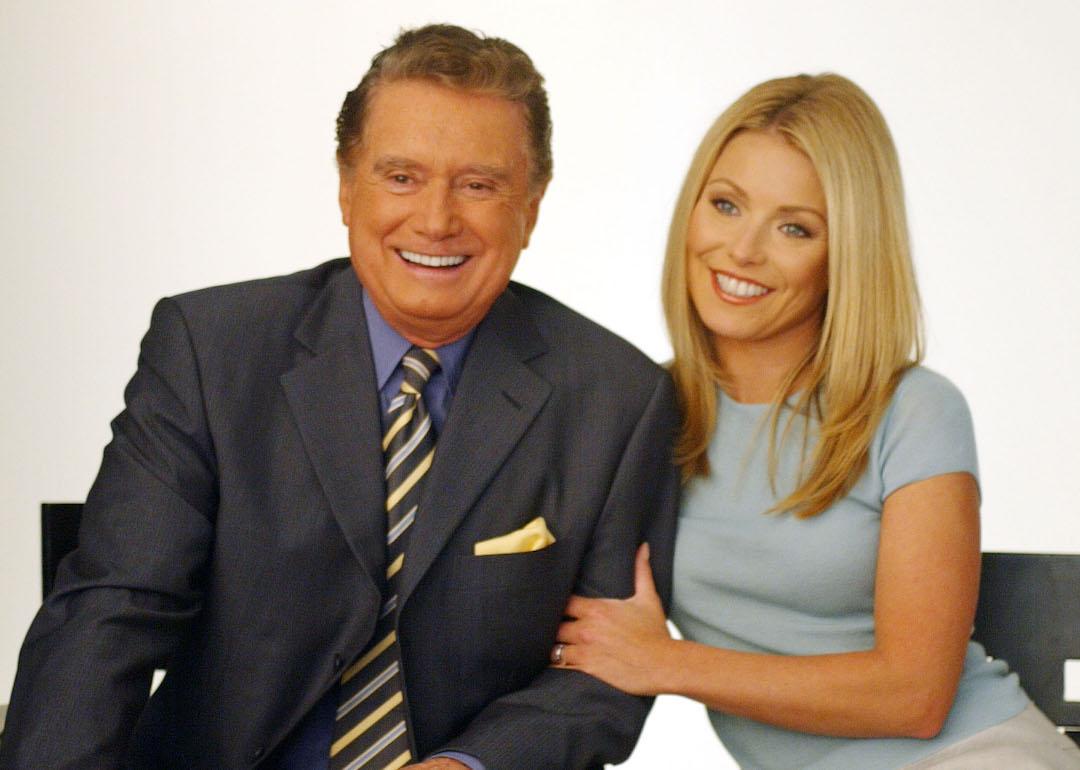 Talk show hosts Kelly Ripa and Regis Philbin at a photo shoot on April 26, 2004 in New York City. 
