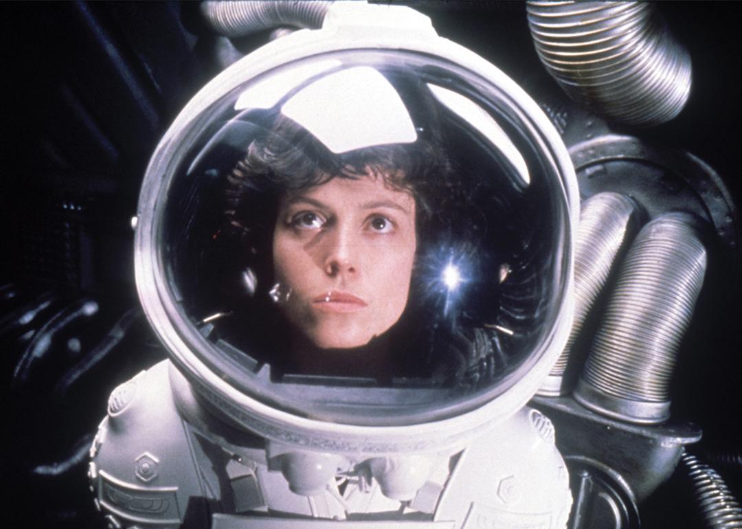 Sigourney Weaver in a spacesuit looking up in the 1979 sci-fi movie 'Alien.'