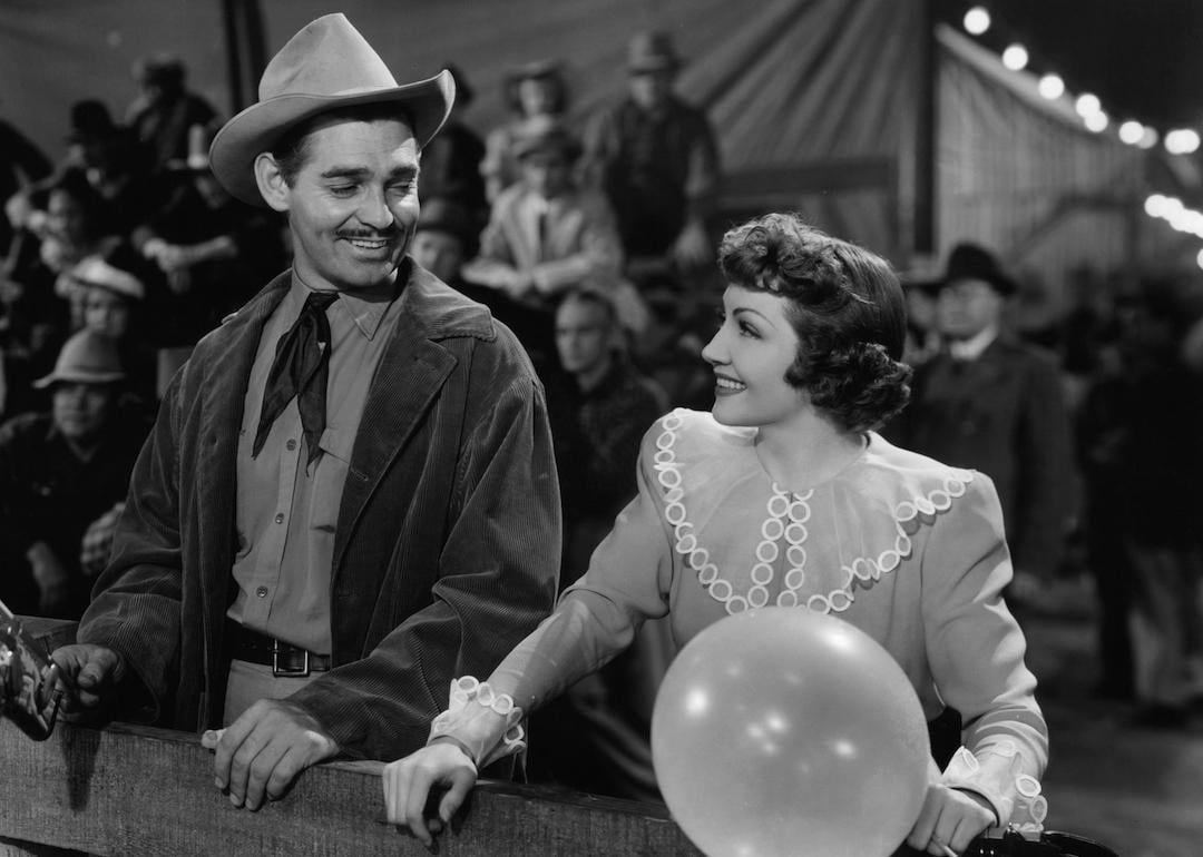 lark Gable at a carnival with Claudette Colbert in a scene from the 1940 film 'Boom Town'