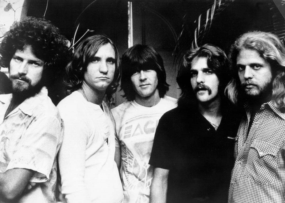 Don Henley, Joe Walsh, Randy Meisner, Glenn Frey, and Don Felder of the Eagles pose for a portrait in 1977.