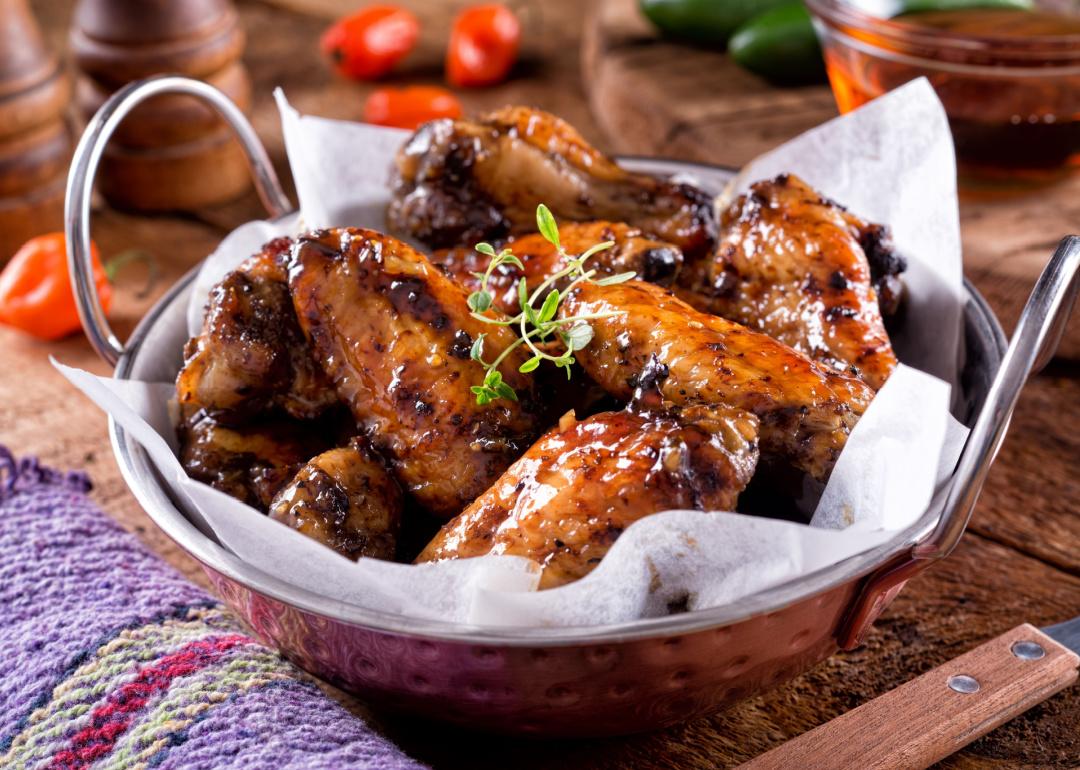 Maple glazed chicken wings in a bowl.