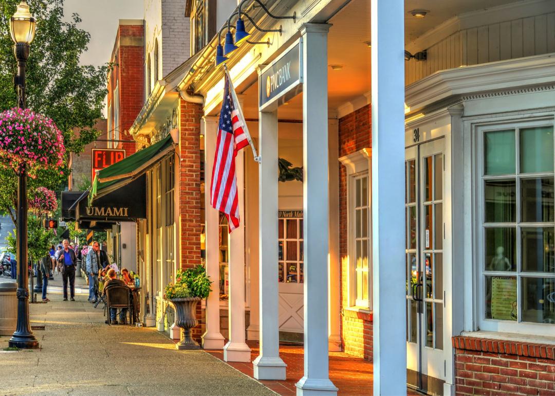 People dining on a main street in a beautiful small town in the U.S.