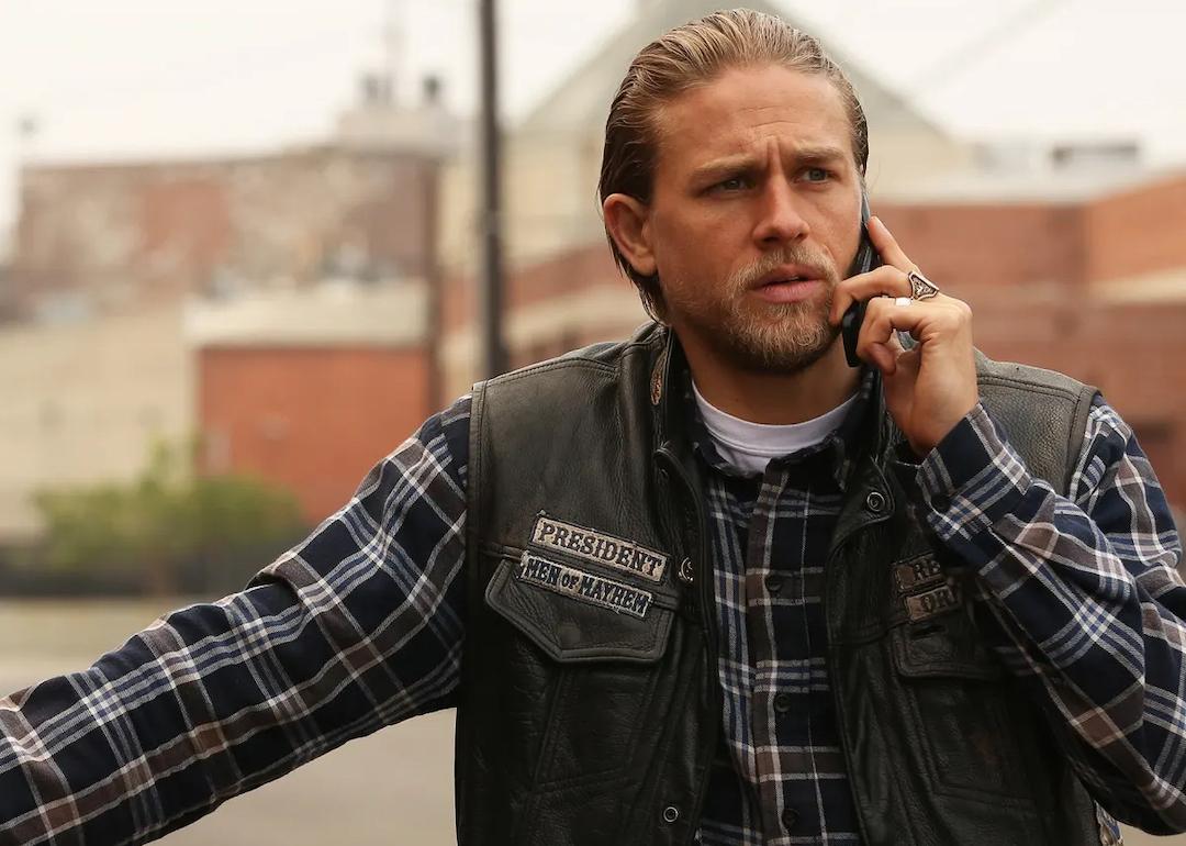 Actor Charlie Hunnam on his cell phone as Jax Teller on the FX drama 'Sons of Anarchy.'
