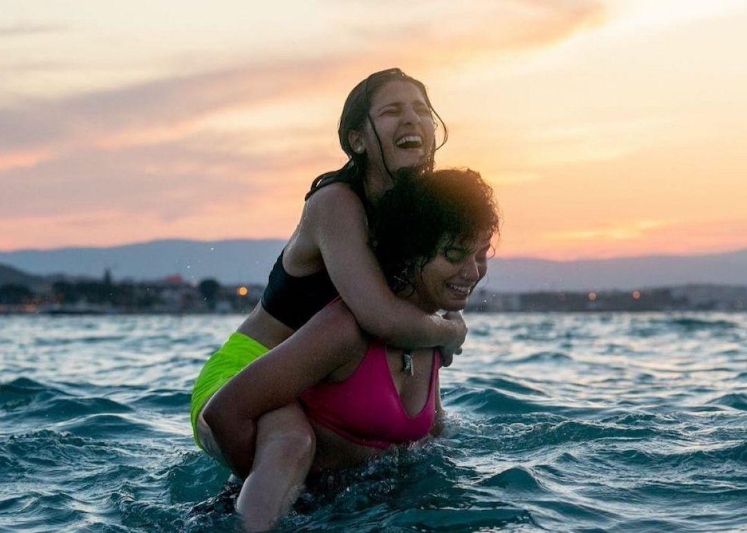 Manal Issa and Nathalie Issa as Sara and Yusra Mardini in the Netflix movie 'The Swimmers.'
