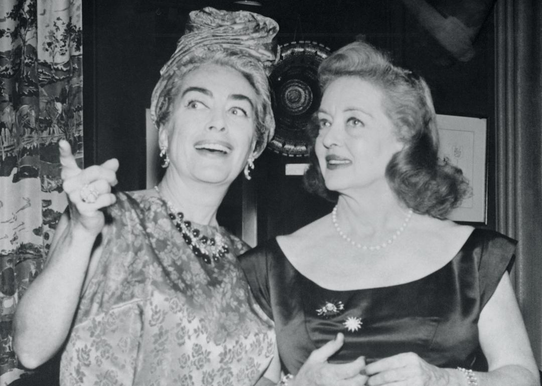 Joan Crawford (right) and Bette Davis (left) are shown united at party in their honor to celebrate 'What Ever Happened To Baby Jane.'