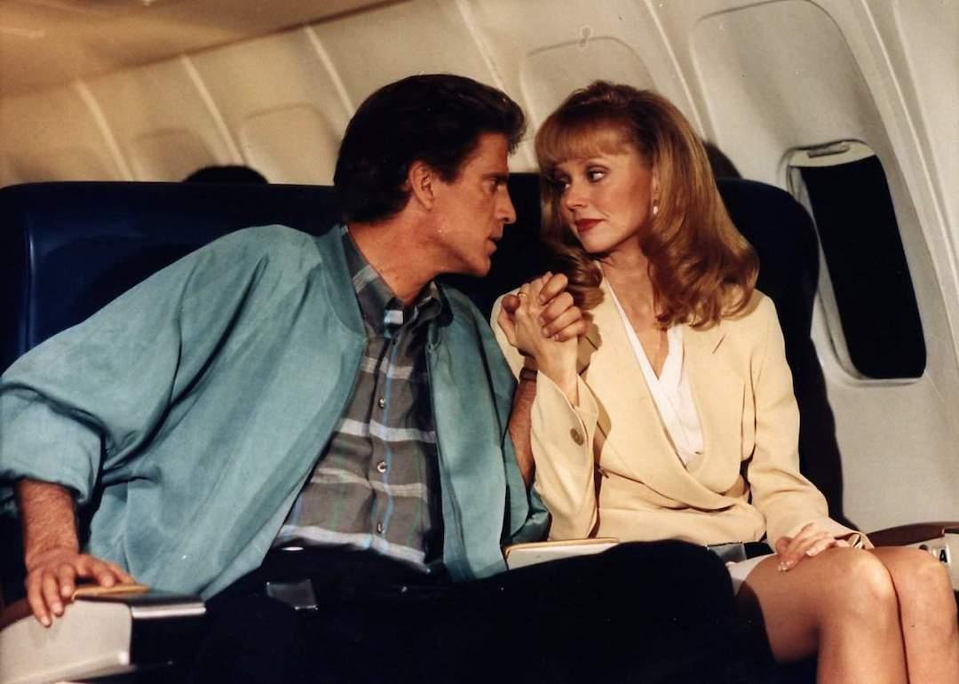 Actors Ted Danson and Shelley Long as Sam Malone and Diane Chambers on a plane on the series finale of 'Cheers' in 1993, titled 'One for the Road.'