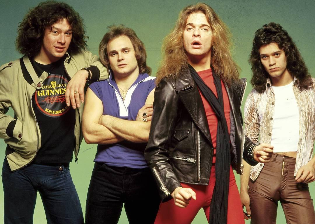 Alex Van Halen, Michael Anthony, David Lee Roth, and Eddie Van Halen of the band Van Halen pose for a group photo.
