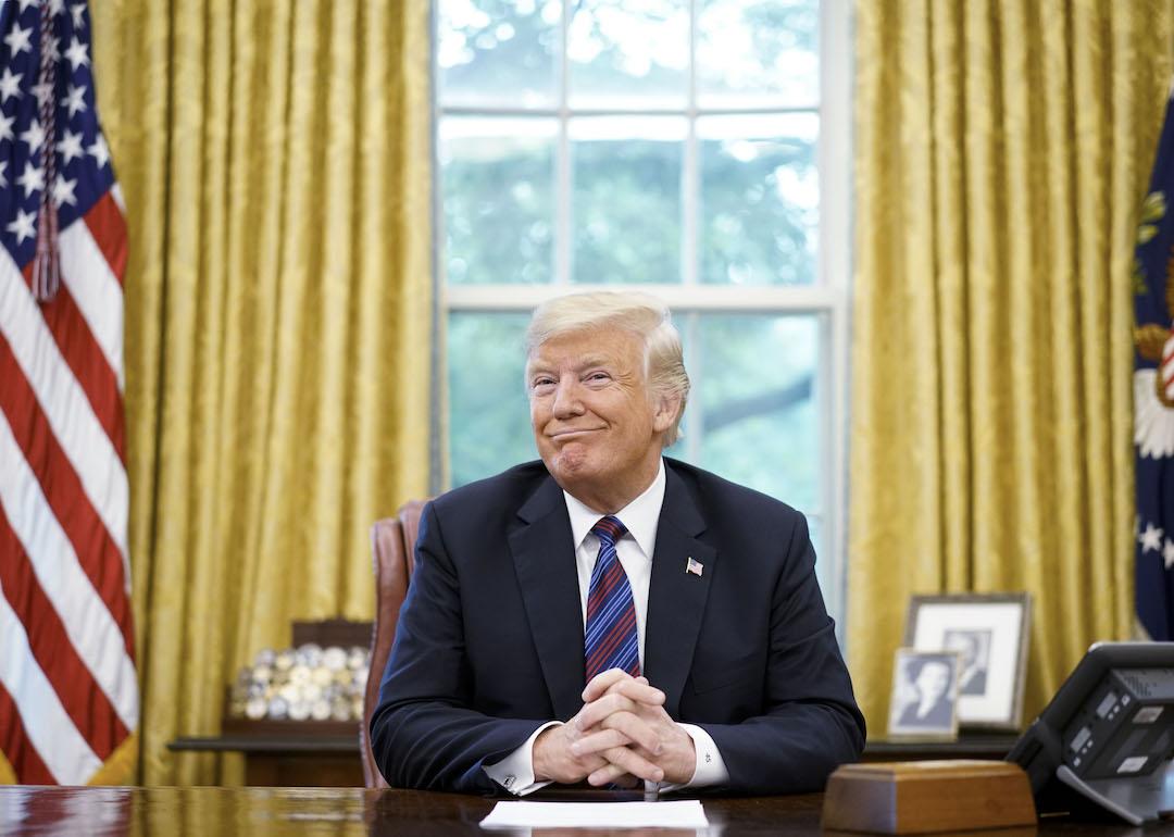 Former US President Donald Trump smiles in the Oval Office of the White House on Aug. 27, 2018.