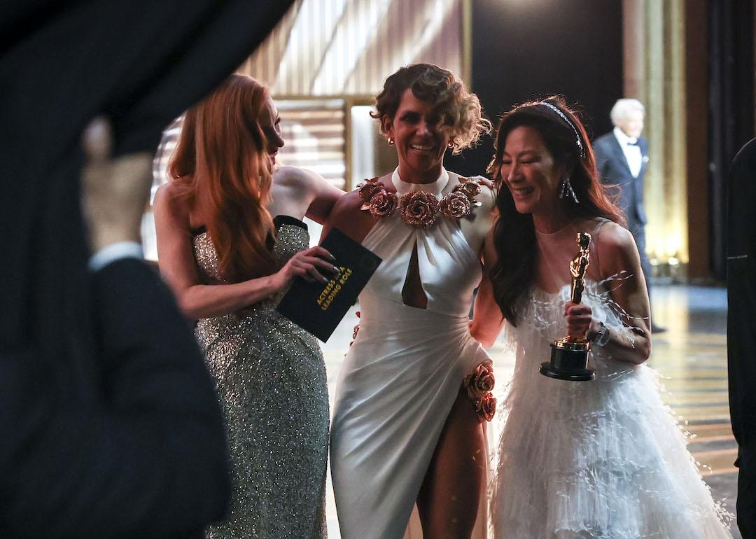 Best Actress Oscar winners Jessica Chastain, Halle Berry, and Michelle Yeoh at the 2023 Academy Awards ceremony.