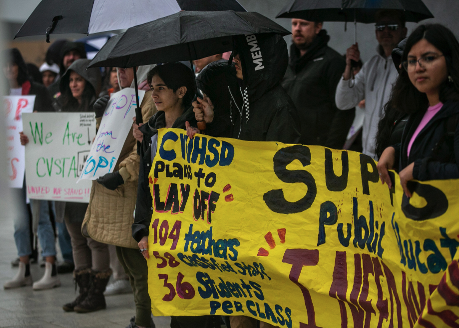 Teachers, students, parents and community members protest upcoming layoffs in Los Angeles.