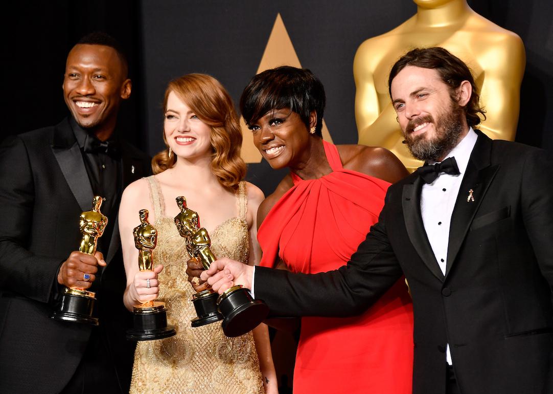 Actors Mahershala Ali, winner of Best Supporting Actor for 'Moonlight'; Emma Stone, winner of Best Actress for 'La La Land'; Viola Davis, winner of the Best Supporting Actress award for 'Fences'; and Casey Affleck, winner of Best Actor for 'Manchester by the Sea,' pose in the press room during the 89th Annual Academy Awards on Feb. 26, 2017 in Hollywood, California.