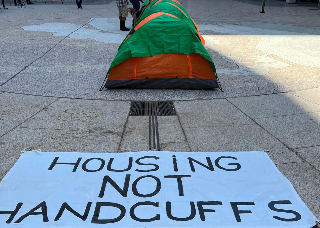 Empty homeless tents staged in front of San Diego's City Hall to demand more housing in March 2022.
