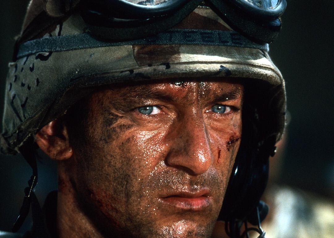 Actor Jason Isaacs wearing a combat hat in a scene from the 2001 war film 'Black Hawk Down.'