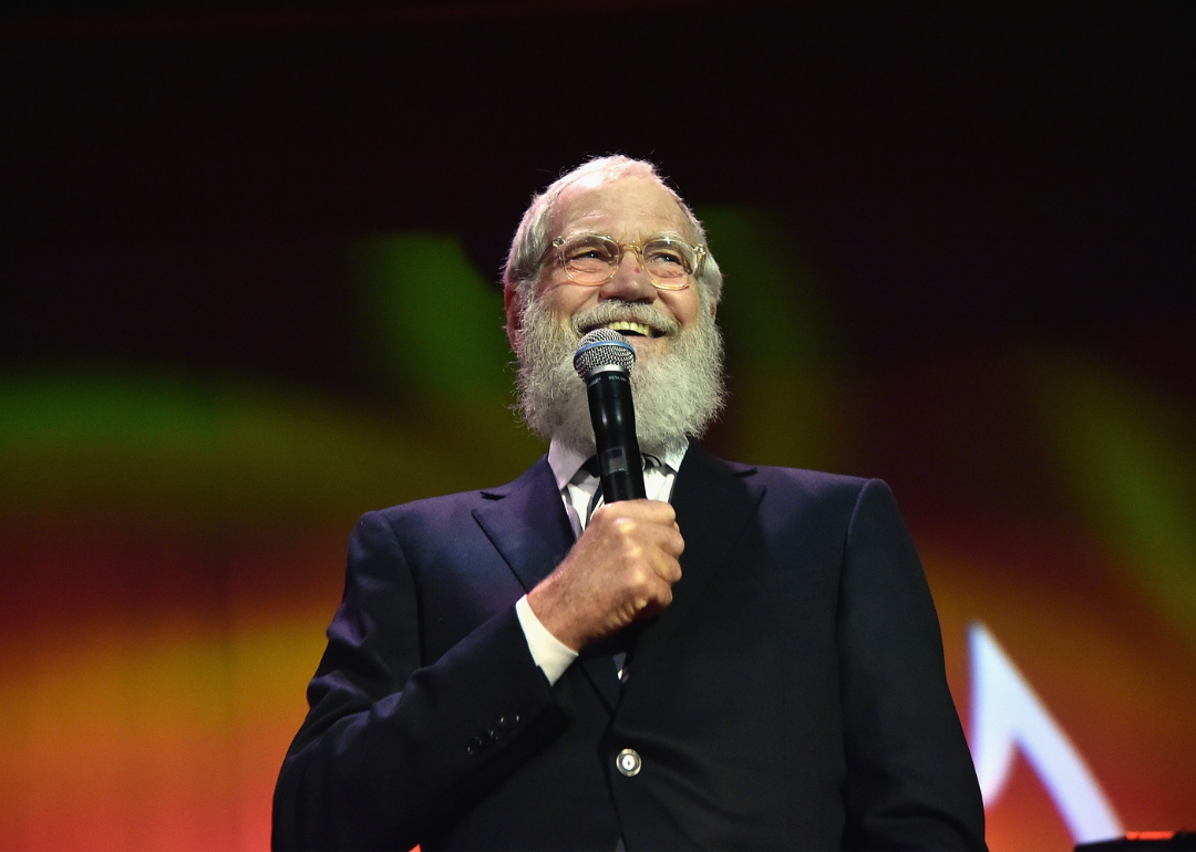 David Letterman speaking onstage during an event circa 2015