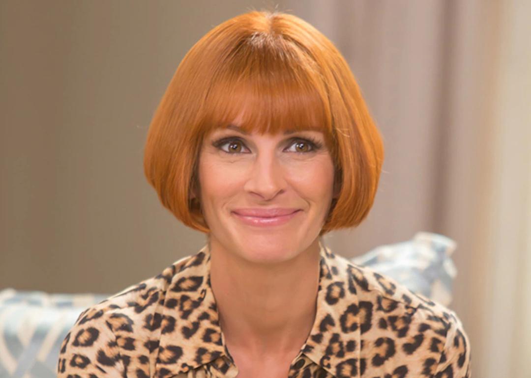 Actor Julia Roberts in a red bob wig and leopard shirt in the 2016 rom-com bomb 'Mother's Day.'
