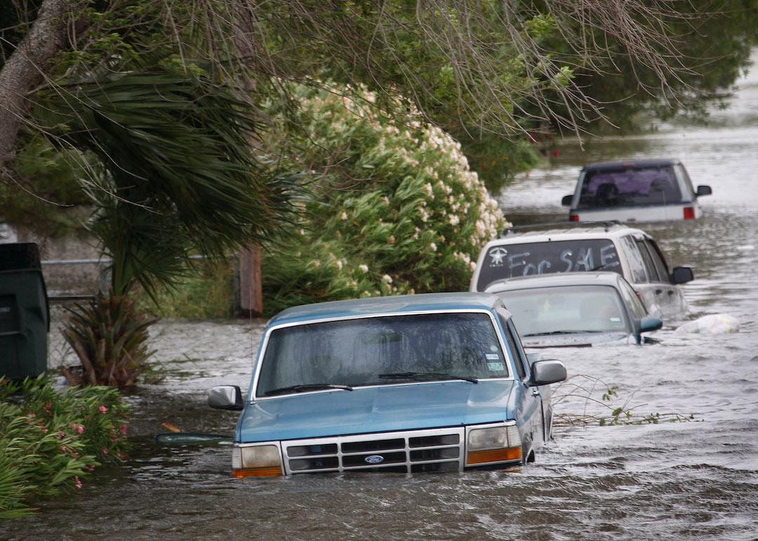 Vehicles flooded by the tidal surge from Hurricane Ike sit along a street Sept. 12, 2008 in Galveston, Texas.