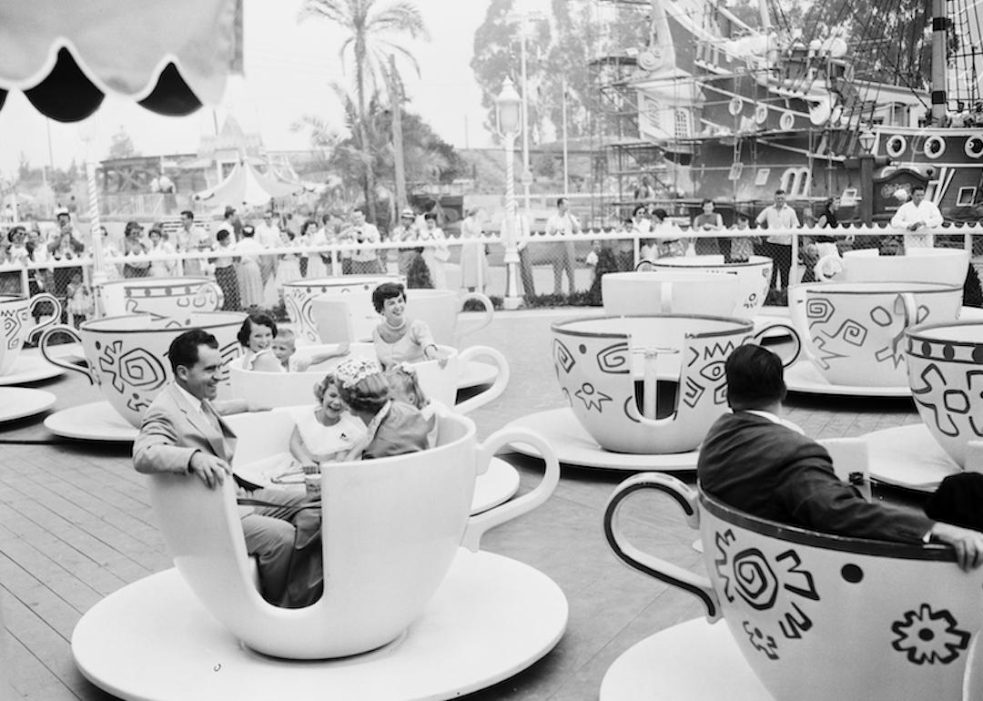 Richard M. Nixon and his family on the Mad Tea Party ride at Disneyland in 1955.