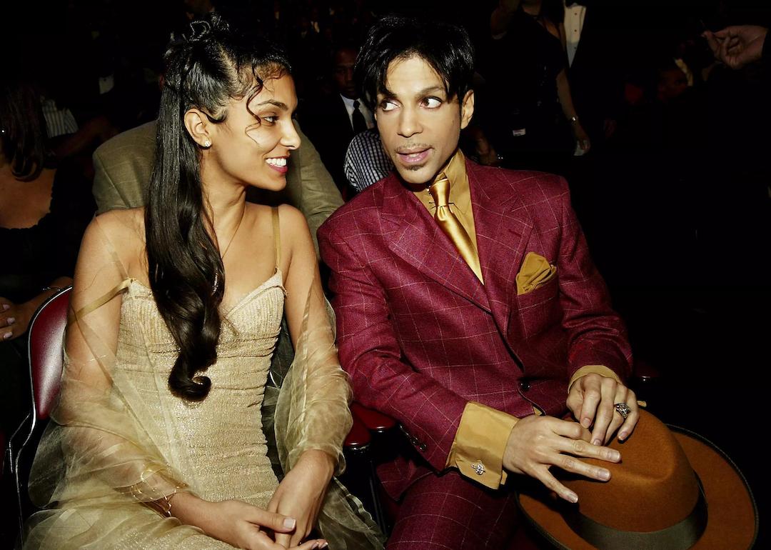 Singer Prince and his second wife, Manuela Testolini, sit in the audience at the 35th Annual NAACP Image Awards at the Universal Amphitheatre in March 2004 in Hollywood, California.