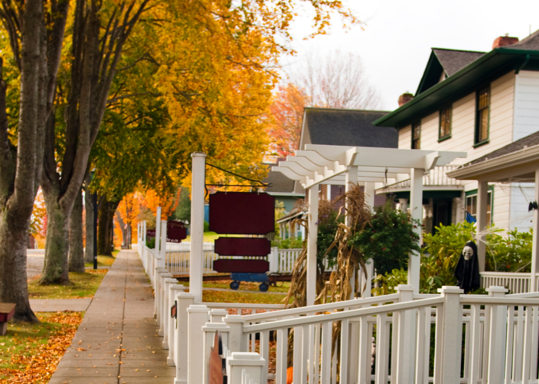 View of sidewalk in an American small town in autumn