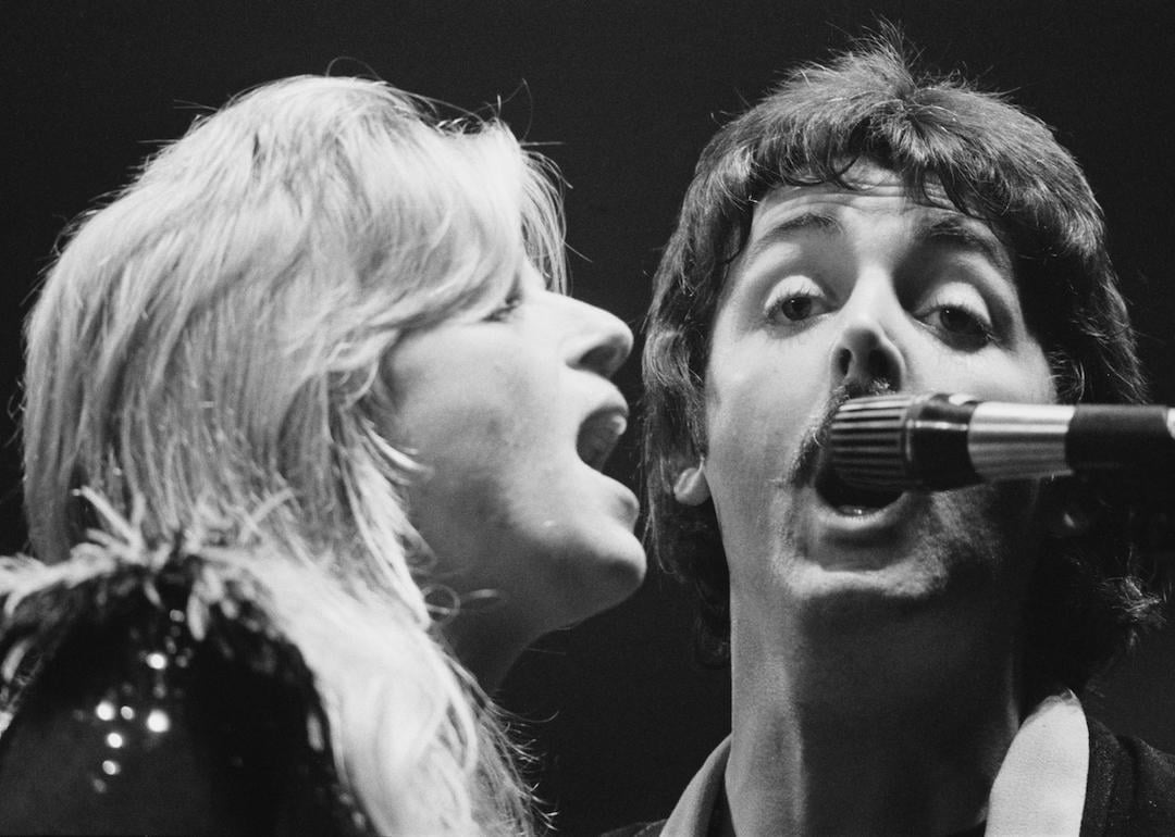 Linda and Paul McCartney perform with Wings in 1976.