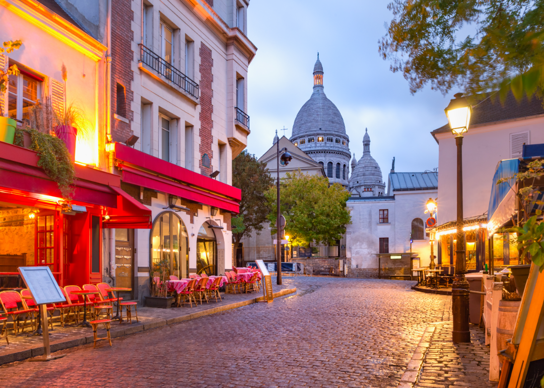 A red bouncy castle in the middle of a beautiful square in Paris