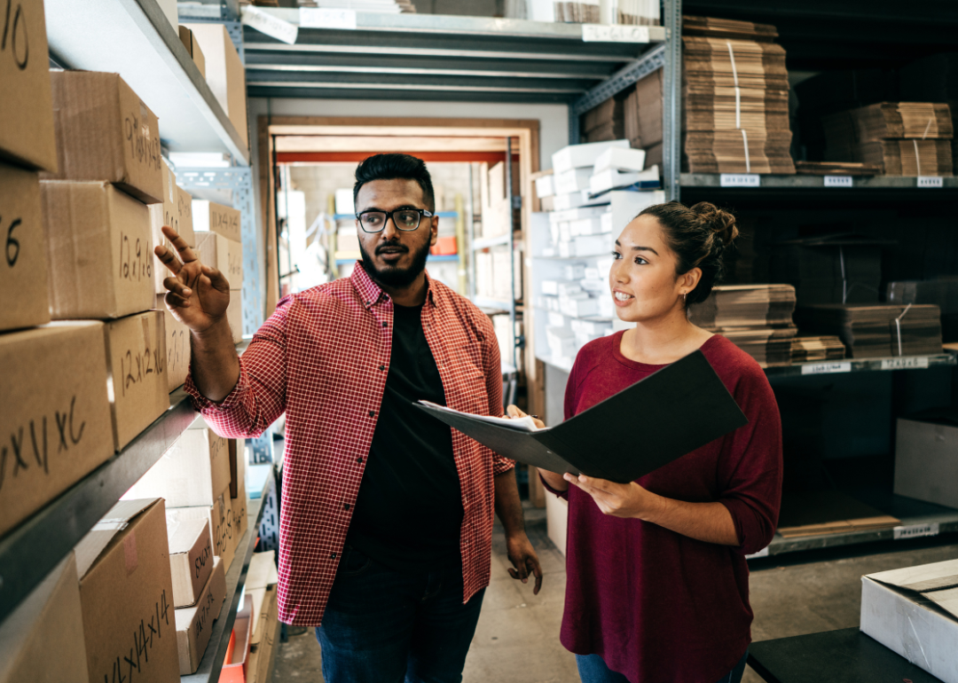 A small business owner talking to a loan officer