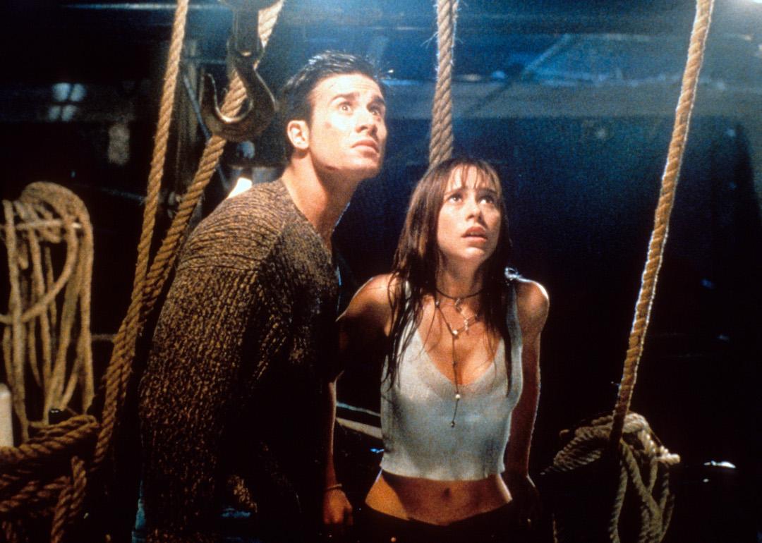 Actors Freddie Prinze Jr. and Jennifer Love Hewitt looking up in fear in a scene from the 1998 horror film 'I Still Know What You Did Last Summer.'