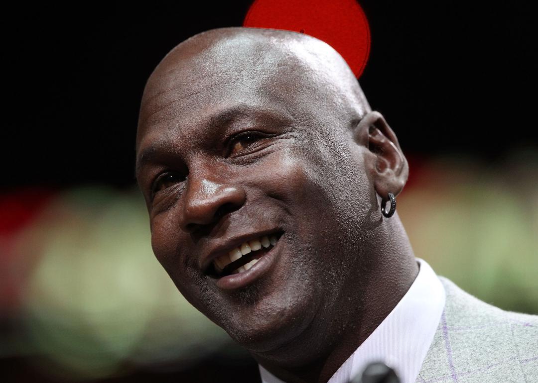 Former player Michael Jordan of the Chicago Bulls addresses the crowd during a 20th anniversary recognition ceremony of the Bulls 1st NBA Championship in 1991 during half-time of a game bewteen the Bulls and the Utah Jazz at the United Center on March 12, 2011 in Chicago, Illinois.