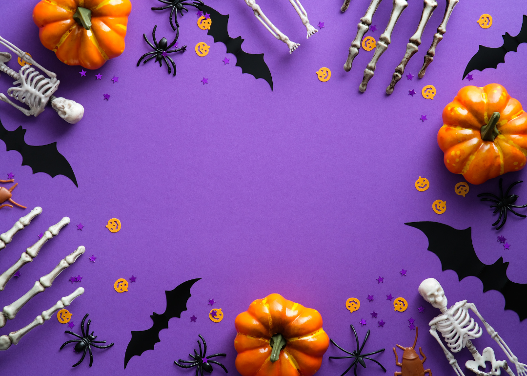 Halloween decorations against a purple backdrop