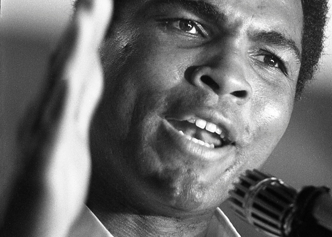 Champion heavyweight boxer Muhammad Ali addresses fans and supporters during press conference during training session in Manila, Philippines, prior to his winning bout against Joe Frazier in September 1975.