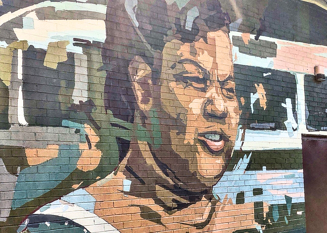 Sarah Mae Flemming mural on the side of a building in Columbia, South Carolina.