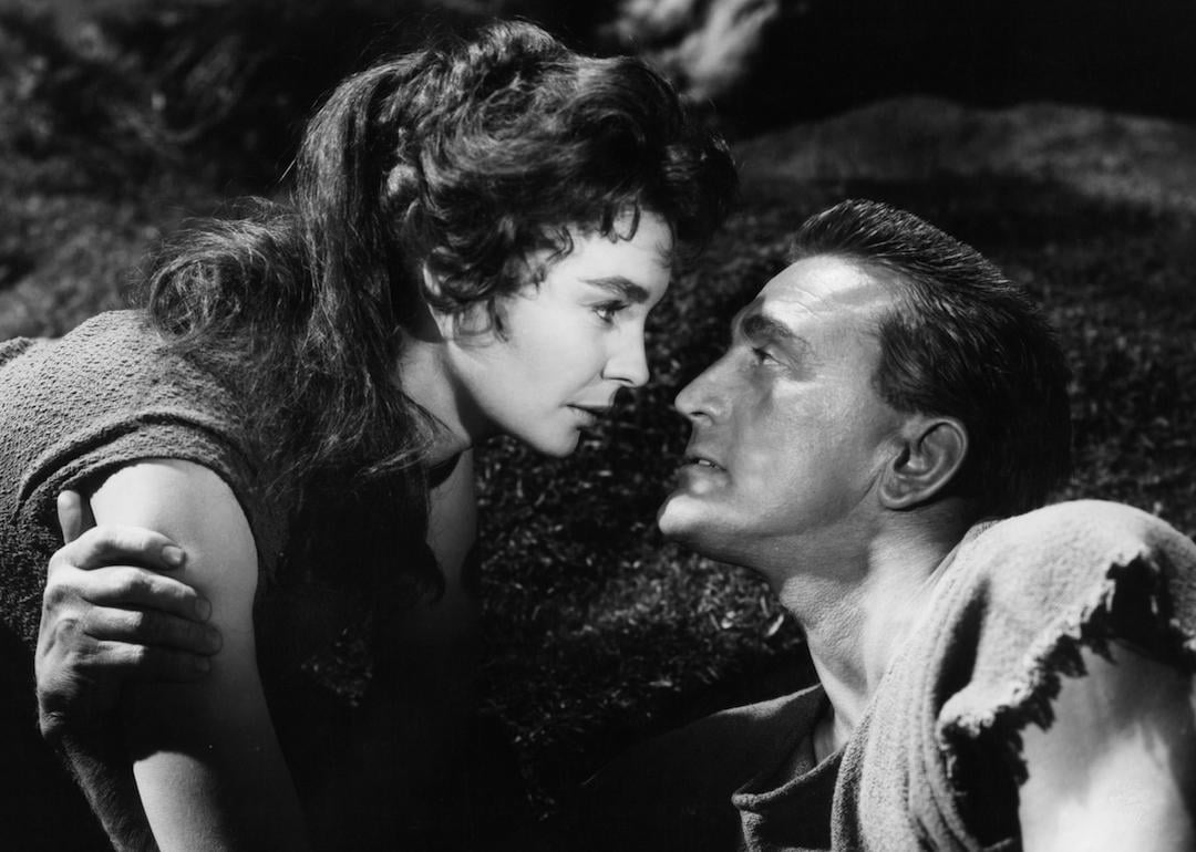 Actors Jean Simmons and Kirk Douglas looking into each others' eyes in a scene from the 1960 film 'Spartacus.'