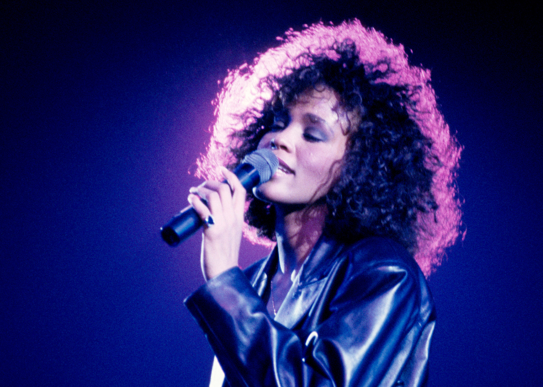 Whitney Houston performs on stage at Wembley Arena, London, on 15th May 1988.
