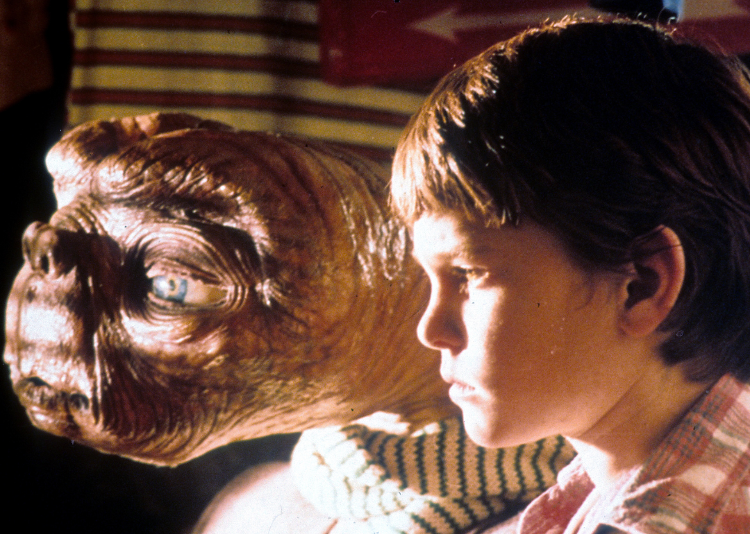 ET looking out window with Henry Thomas in a scene from the film 'E.T. The Extra-Terrestrial', 1982.