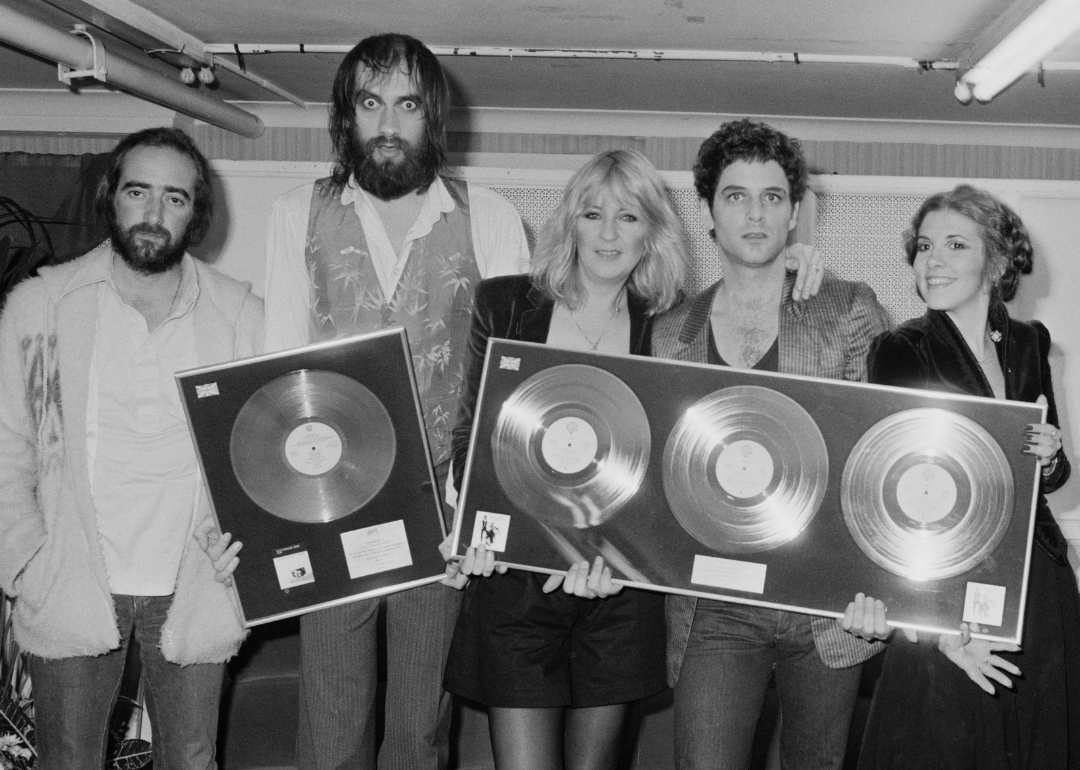 Rock band Fleetwood Mac with awards for British sales of their albums 'Rumours' and Tusk', Wembley Arena, London, June 1980. Left to right: John McVie, Mick Fleetwood, Christine McVie, Lindsey Buckingham and Stevie Nicks.
