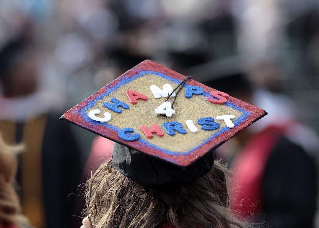 A graduate of Liberty University, one of the largest Christian colleges in the U.S., sports a decorated cap during commencement ceremonies in Lynchburg, Virginia.