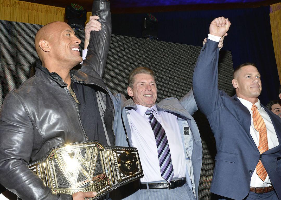Wrestler Dwayne 'The Rock' Johnson, World Wrestling Entertainment Inc. Chairman Vince McMahon, and wrestler John Cena attend the WrestleMania 29 Press Conference at Radio City Music Hall in New York City.